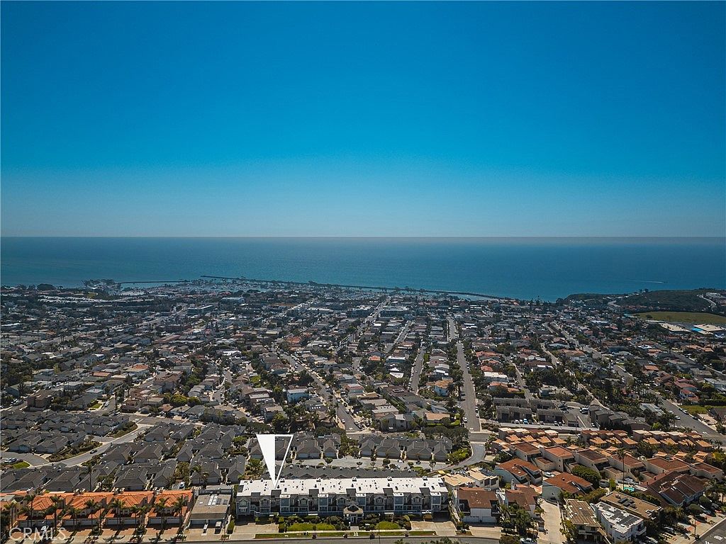 Chef's kitchen with Italian marble counters and custom cabinetry.