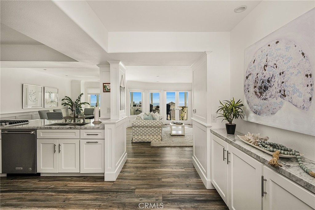Dining area opening to the full-length balcony.